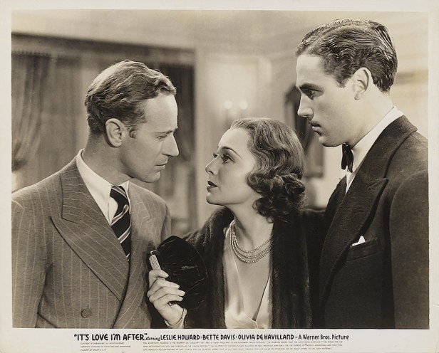 Marcia is in love with Basil, but is already engaged to Henry. Who will she choose? (Image via doctormacro.com)