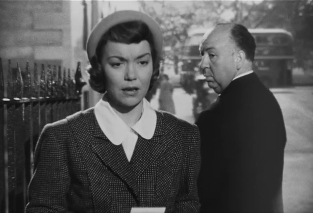 New favorite Hitchcock cameo: Hitch gives "Eve" the stink eye when he passes her on the street as she practices what she'll say to Charlotte. (Screen capture by Lindsey for TMP)