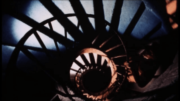 One of my favorite shots in the film. Like my dearest Alfred Hitchcock, I love stairs. (Screen capture by Lindsey for TMP)