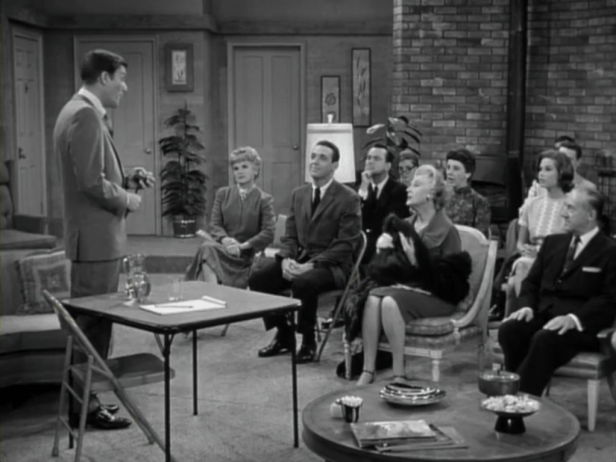 Rob leads a fundraising meeting as PTA chairman. (Screen capture by Lindsey for TMP)