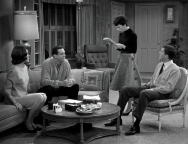 The Petries and their friends are terrified to read in the newspaper that a burglar has struck four homes in their neighborhood. (Screen capture by Lindsey for TMP)