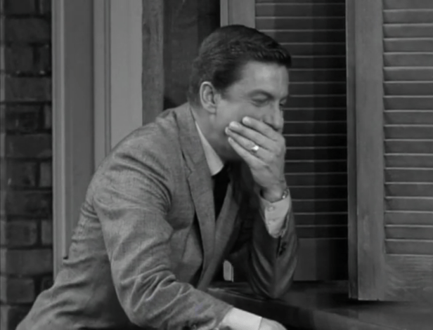 Rob eavesdrops on Laura when she calls Millie to make party plans. (Screen capture by Lindsey for TMP)