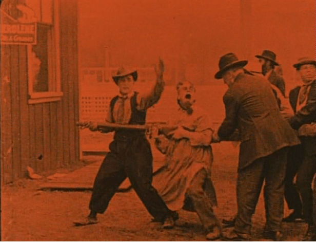 Keaton's got to put out a fire! (Screen capture by Lindsey for TMP)