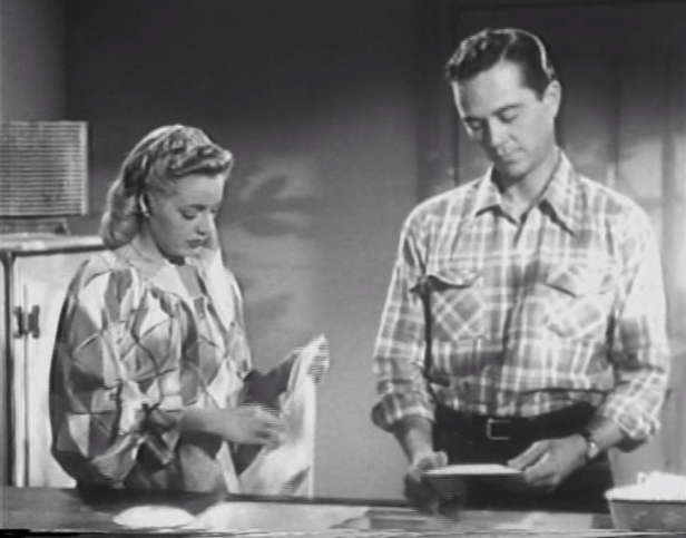 Will this dish-drying lady of the boarding house be Harold's next victim? (Screen capture by Lindsey for TMP)