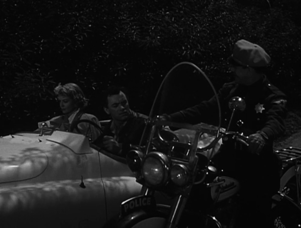 Despite a few quick run-ins with police officers, Frank and Connie make it to the start of the race. (Screen capture by Lindsey for TMP)