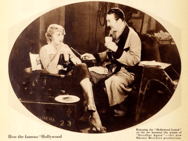 Joan Blondell and Warren William take a break on set. (Photoplay Magazine via Archive.org/Screen capture by Lindsey for TMP)