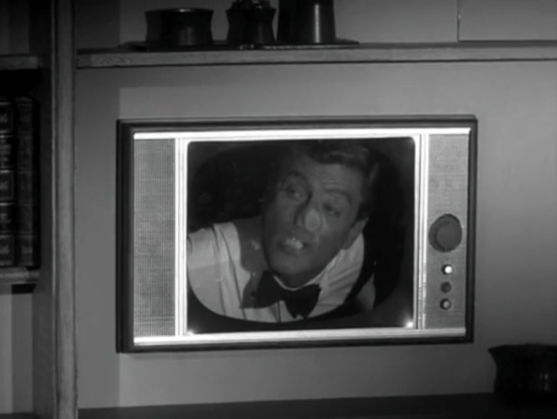 Rob tries to find a way into Alan's office to steal back the script. (Screen capture by Lindsey for TMP)