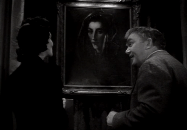 Mona Maris and Thomas Mitchell, the standout performers of the film, share a scene. (Screen capture by Lindsey for TMP)