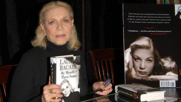 Bacall at a signing of By Myself and Then Some (Image via CBS)